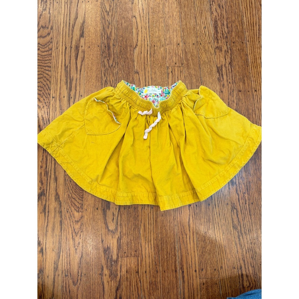 Mini Boden Girls Mustard Yellow Corduroy Heart Pocket Skirt Floral Lining 6-7Y